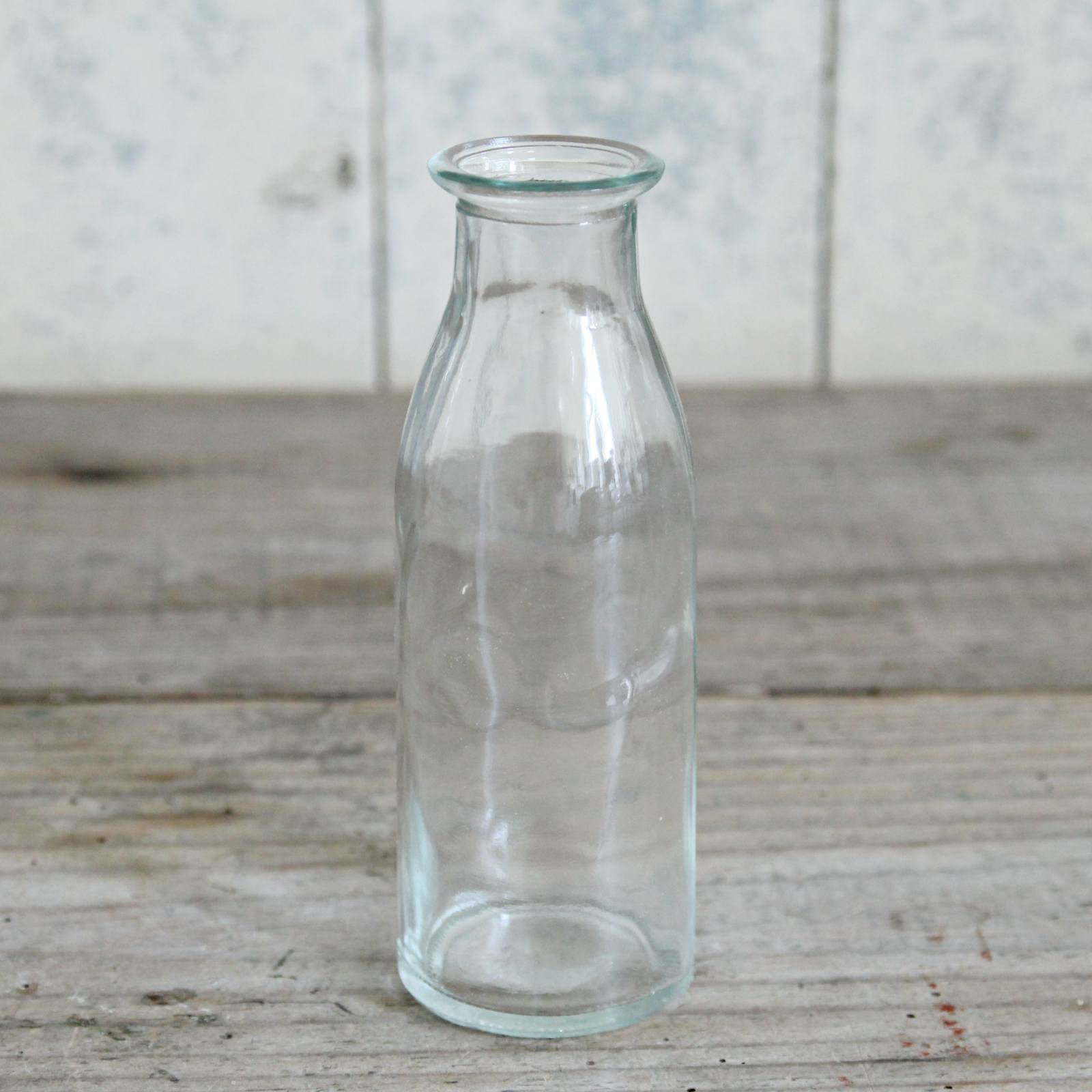 Mini milk bottle, lovley to use as a little milk jug, or perfect for a sprig of flowers