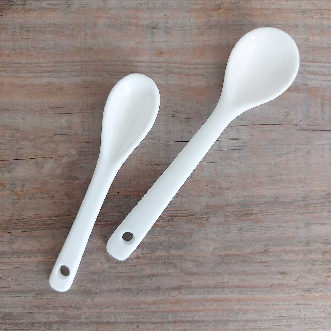 White ceramic salt spoon