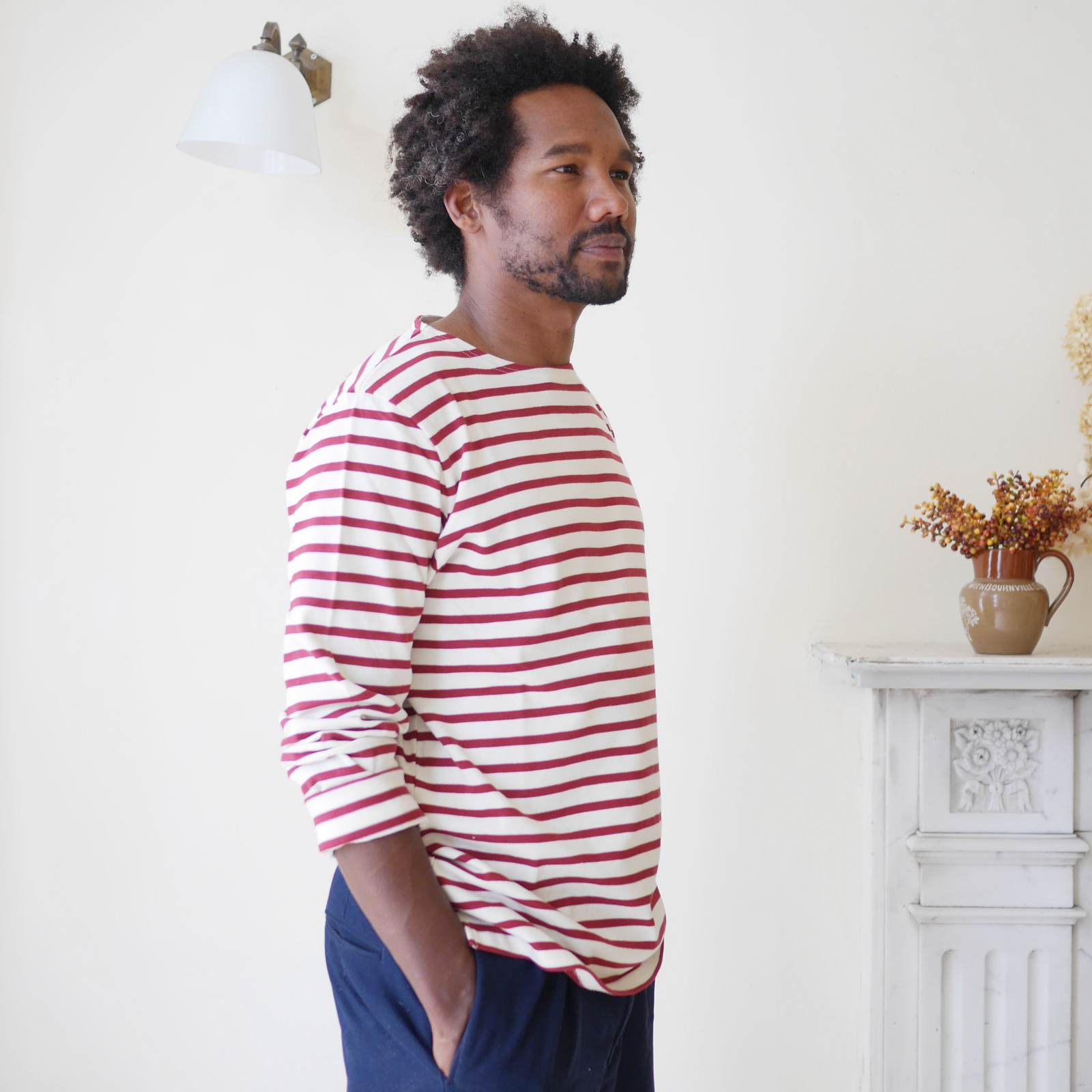 Breton top by Mousqueton on man in cream and brick colour