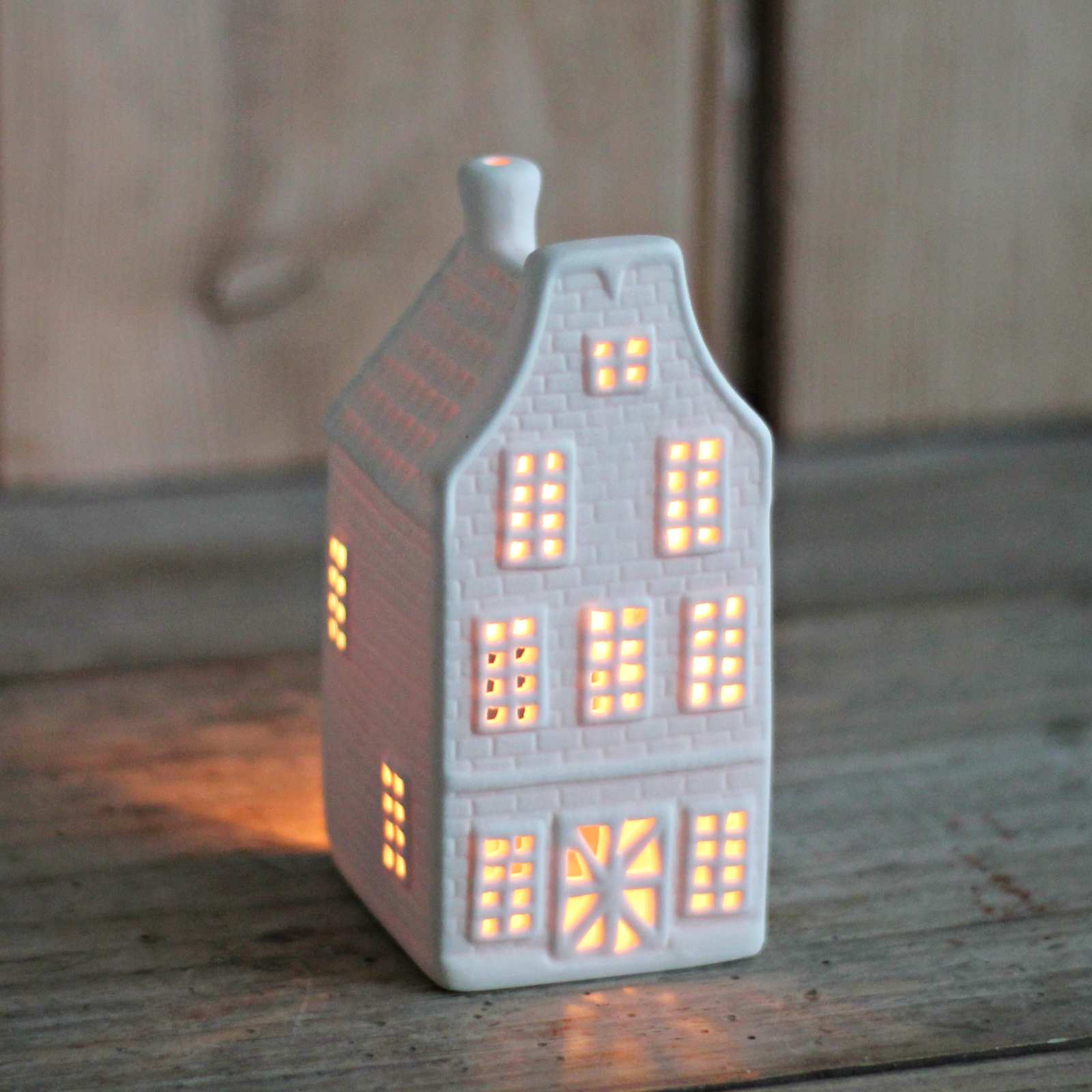 porcelain house tealight holder illuminated