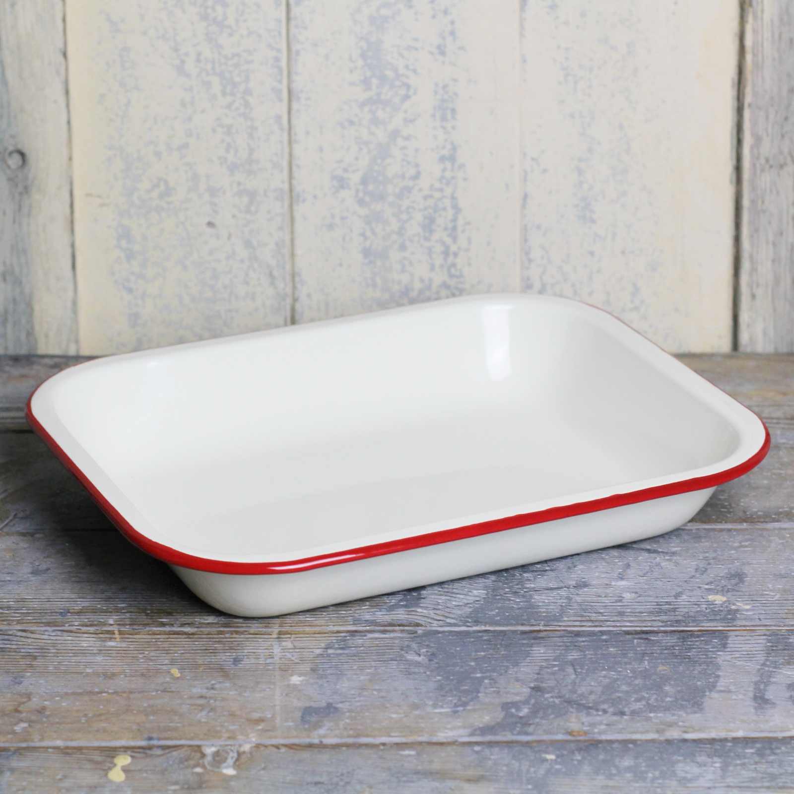 Enamel roasting dish, cream with a red rim